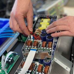 APEX SMA-2 modules being loaded into a CloudPower amplifier